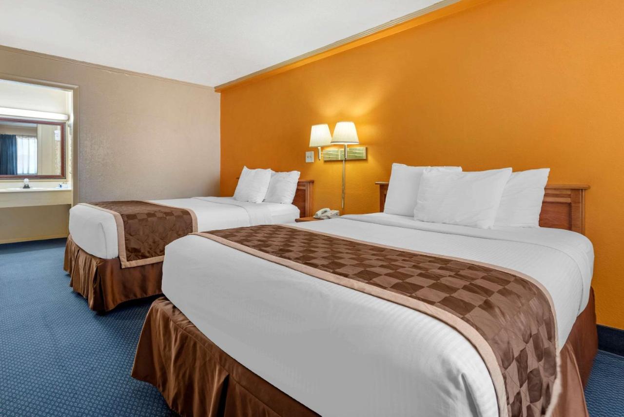 Asam Hotel Goodland Экстерьер фото